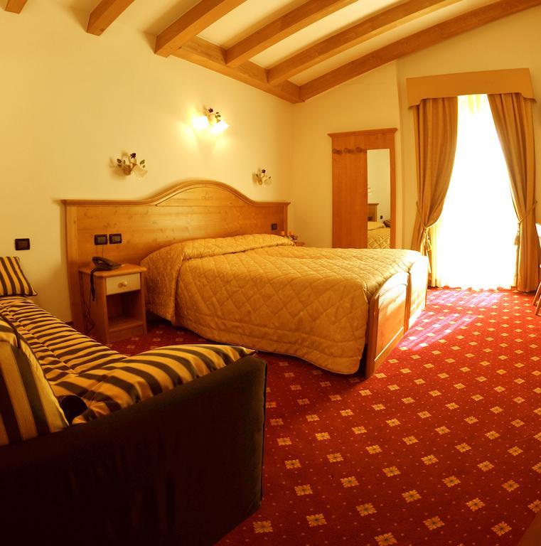 Hotel Il Maniero Осана Стая снимка